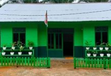 PTPN VI Serahkan Bantuan Bedah Rumah di Wilayah Kodim 0420 Sarko
